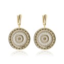 Gold St. Clare rosewindow Canticum collection earrings with stones