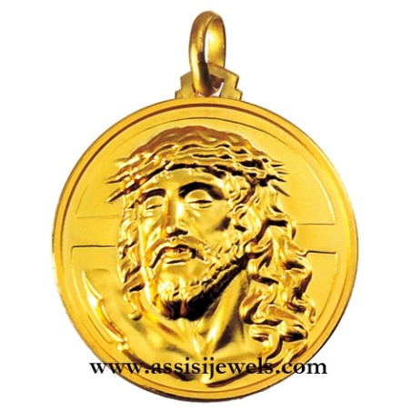 18 kt gold face of Christ Crucified medal